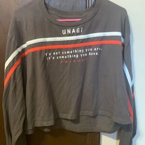 This is a vintage F.R.I.E.N.D.S shirt. Thrifted 2 years ago for little sister.